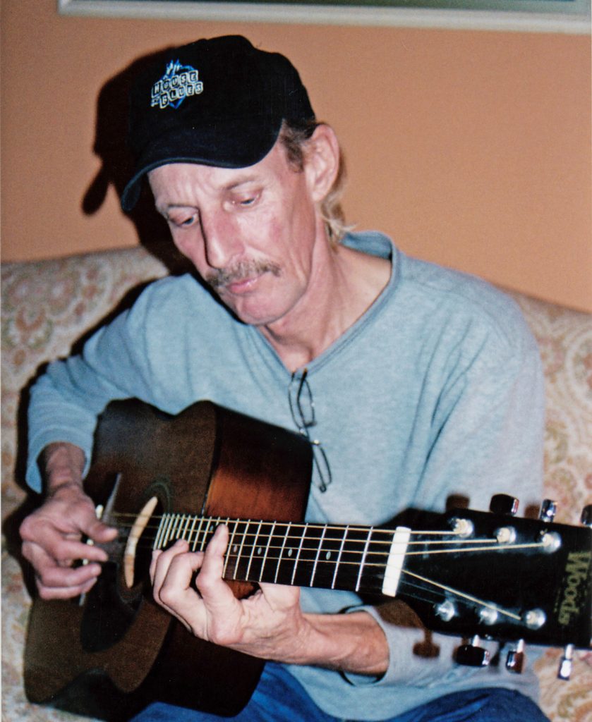 Blues guitarist and vocalist Kenny Brown of Potts Camp, Mississippi (photo by Amy Evans for the Mississippi Arts Commission).