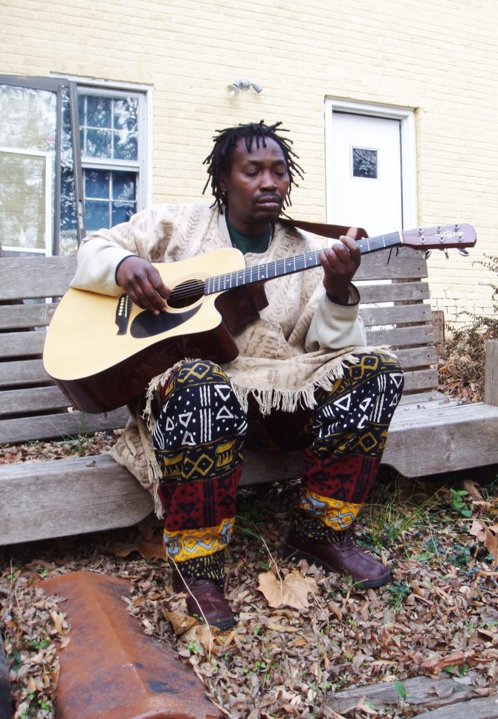 Senegalese singer and guitarist Guelel Kumba of Oxford (photo by Scott Barretta for the Mississippi Arts Commission).