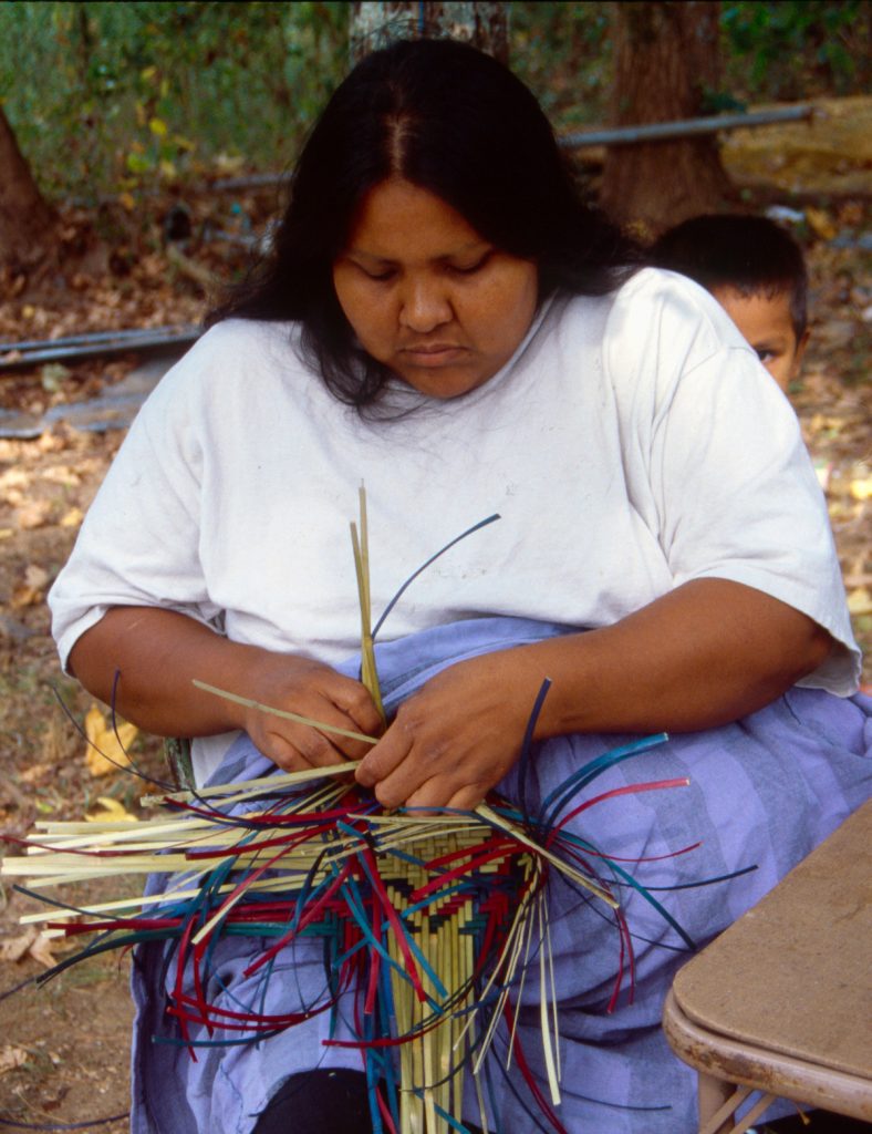 Norma Thompson of Conehatta making an egg basket.