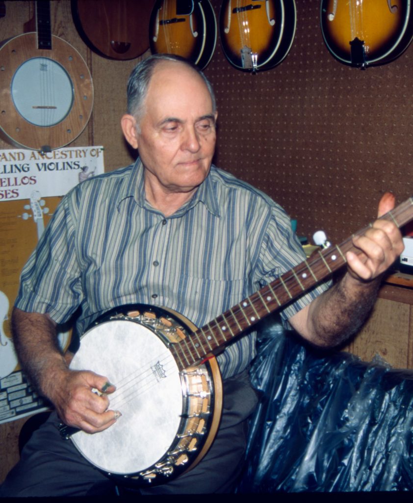 M.B. Green of Louin playing one of his custom made banjoes.