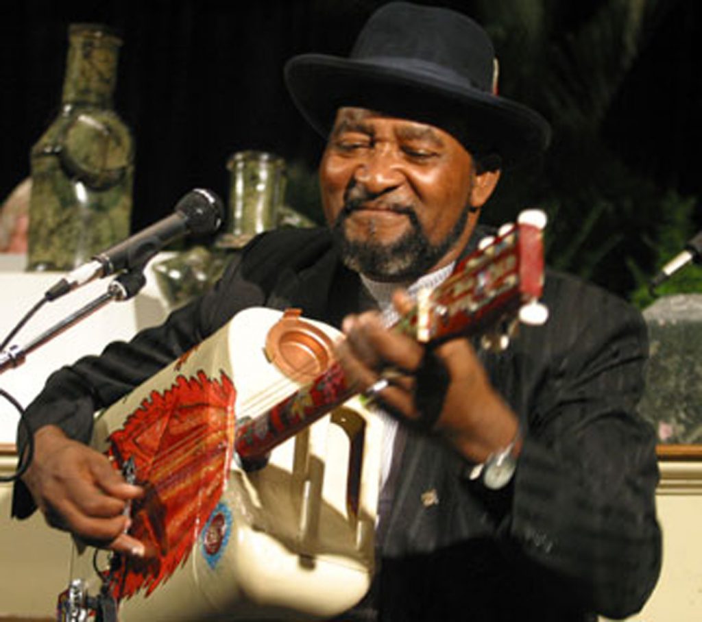 James “Super Chikan” Johnson performing on his “chikantar” at the 2004 Governor’s Awards ceremony, Jackson.