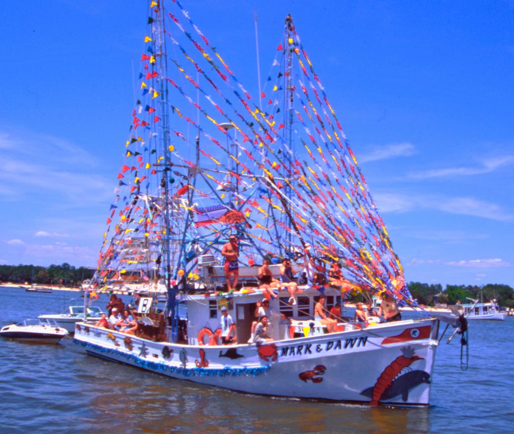 Shrimp trawler Mark and Dawn participates in the 1999 Blessing of the Fleet ceremony.
