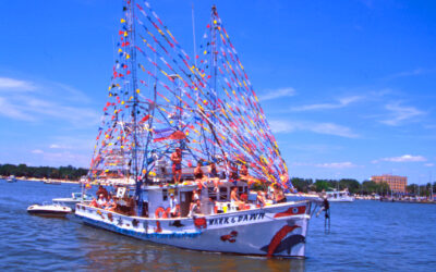 Shrimp trawler Mark and Dawn participates in the 1999 Blessing of the Fleet ceremony.
