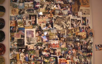 Family and memories on a wall in her studio.