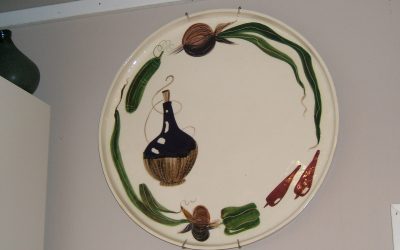Platter shaped by her father and painted by her mother.
