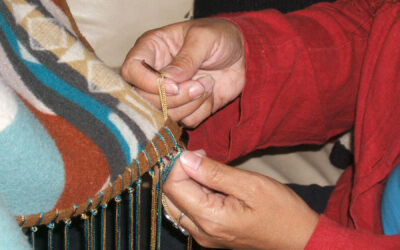 Fringing a shawl, detail (photo by Chris Goertzen for the Mississippi Arts Commission).