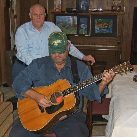 Father and son musicians John (standing) and Coleman Stuart of Bellevue, Mississippi (photo by Chris Goertzen for the Mississippi Arts Commission).