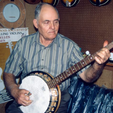 M.B. Green of Louin playing one of his custom made banjoes.