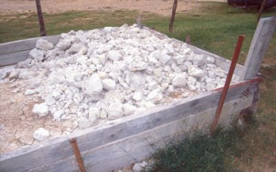 Storage bin with recently dug clay.Stewart digs his own clay from deposits within Winston County. He cleans and softens the clay through a multi-step process.