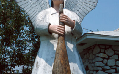 The angel. She is made out one log, except for her wings, which were attached to the main piece.