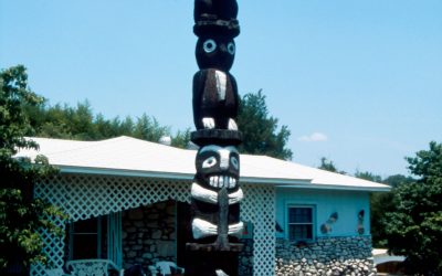 Totem pole. When this tree in Adams' yard died, he transformed it into a sculpture.