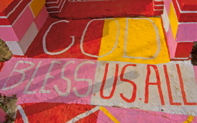 Message painted on the front walkway of the Grocery.