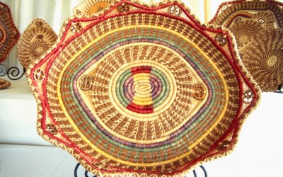 Large pine straw tray created with different colors of raffia.