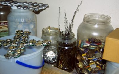 Chism's raw supplies: bottle caps and wire hangers.