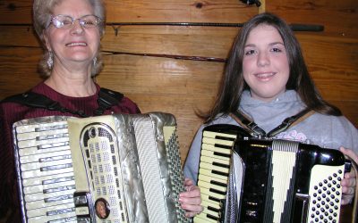 Peggy Sparks Adams received at Folk Art Apprenticeship grant from the Arts Commission in 2006. She worked with Amber Hale (right), teaching her gospel accordion techniques.