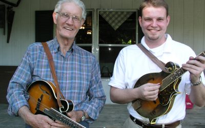 Bryan Sparks (left) with his grandson Chad Hastings. Sparks was a recipient of a Folk Art Apprenticeship Award from the Arts Commission in 2004-05. He used the grant to work with Hastings on bluegrass mandolin techniques.