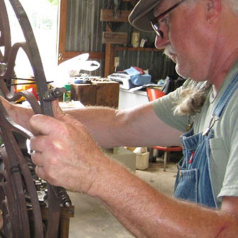 Metal worker Larry House at his home studio in Picayune.
